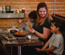 A family eating at Harper's