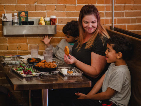 A family eating at Harper's