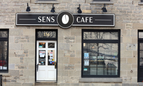 The stone exterior of SENS Café